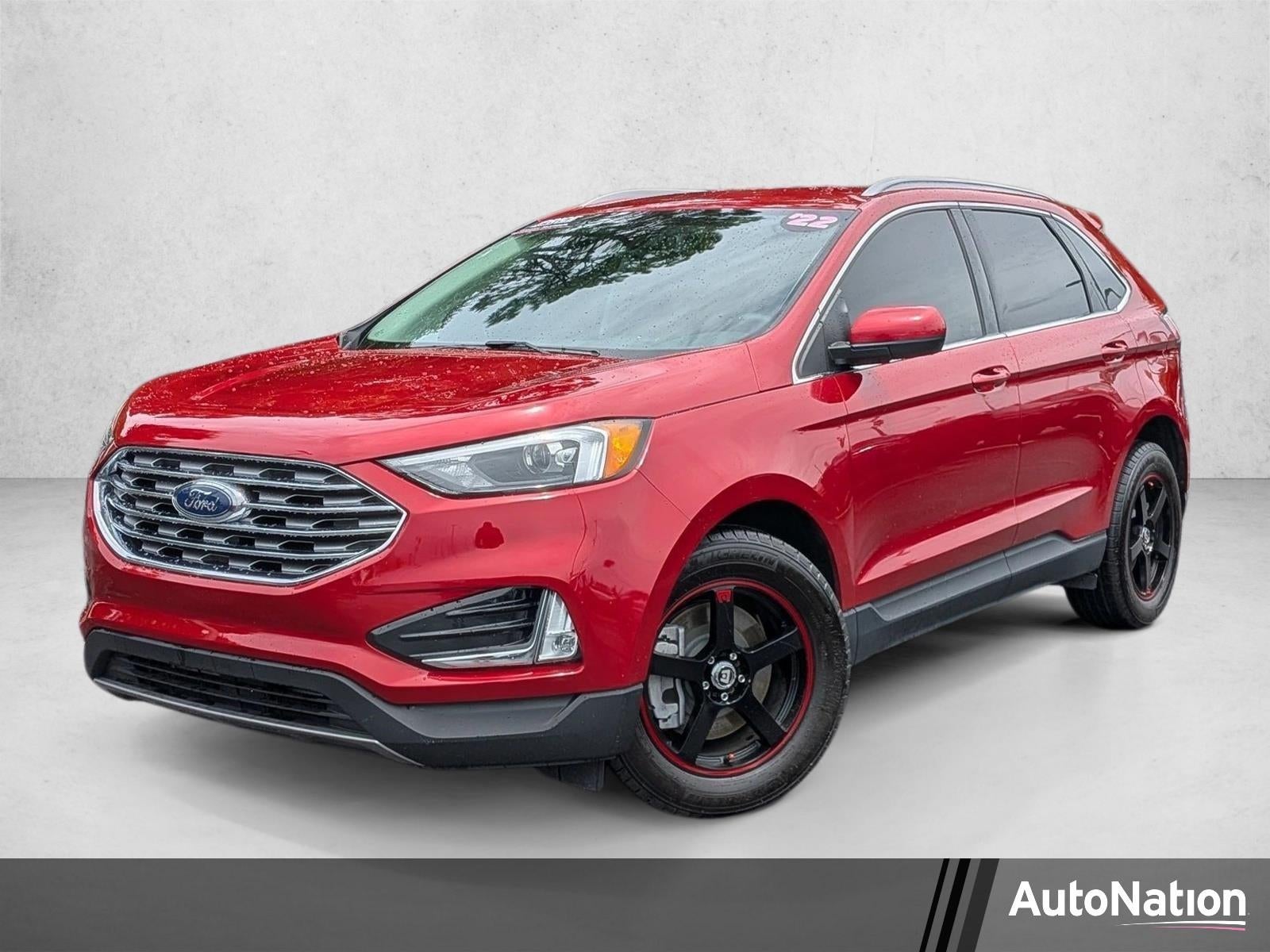 2022 Ford Edge SEL AWD in Rapid Red Metallic Tinted Clearcoat — front three-quarter view