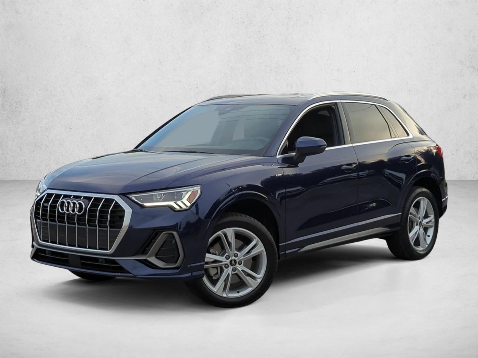 2022 Audi Q3 S line Premium Plus 45 TFSI quattro in Navarra Blue Metallic — front three-quarter view